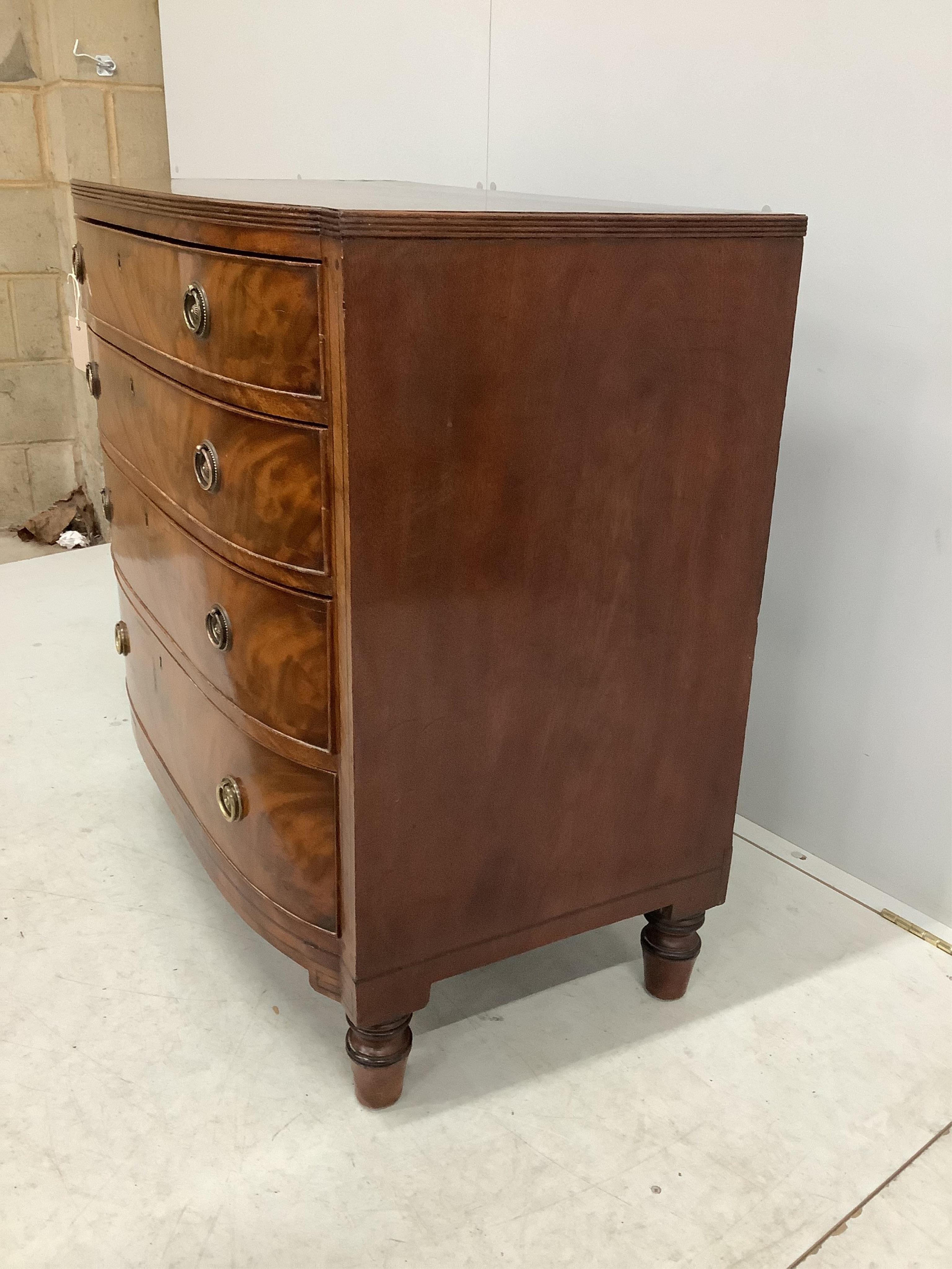 A Regency rosewood banded mahogany bow front chest, width 92cm, depth 54cm, height 91cm. Condition - fair